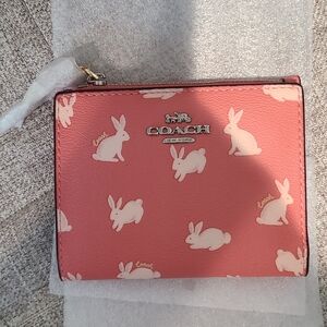 New coral Coach bunny snap close wallet